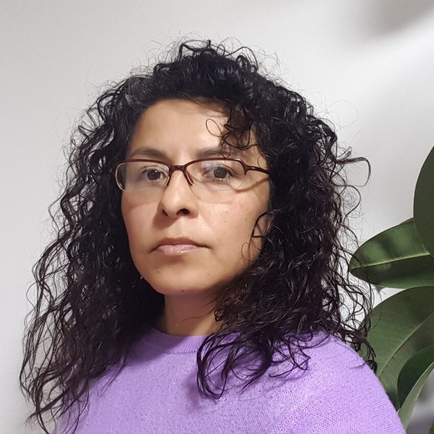 Headshot of Zuleima, a South American woman with black hair.