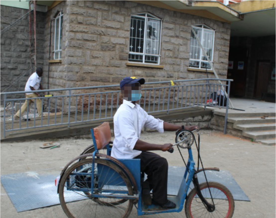 Image of a mobility bike navigating the steets of Nairobi Cover Image