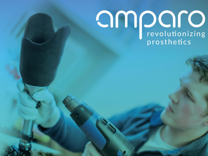 Man holding a prosthetic device Cover Image
