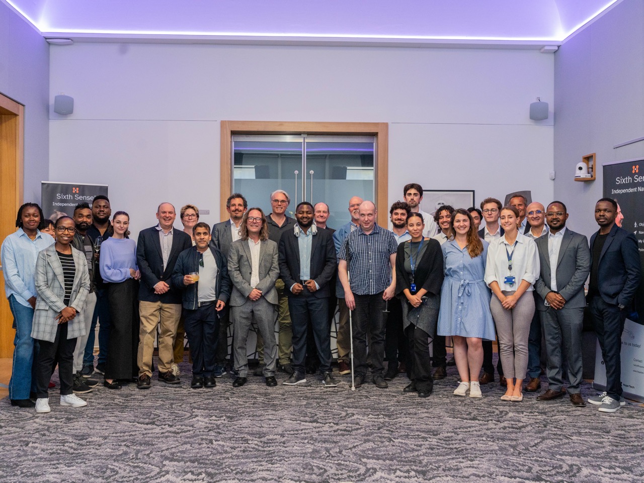 A group photo of the people present at the launch event