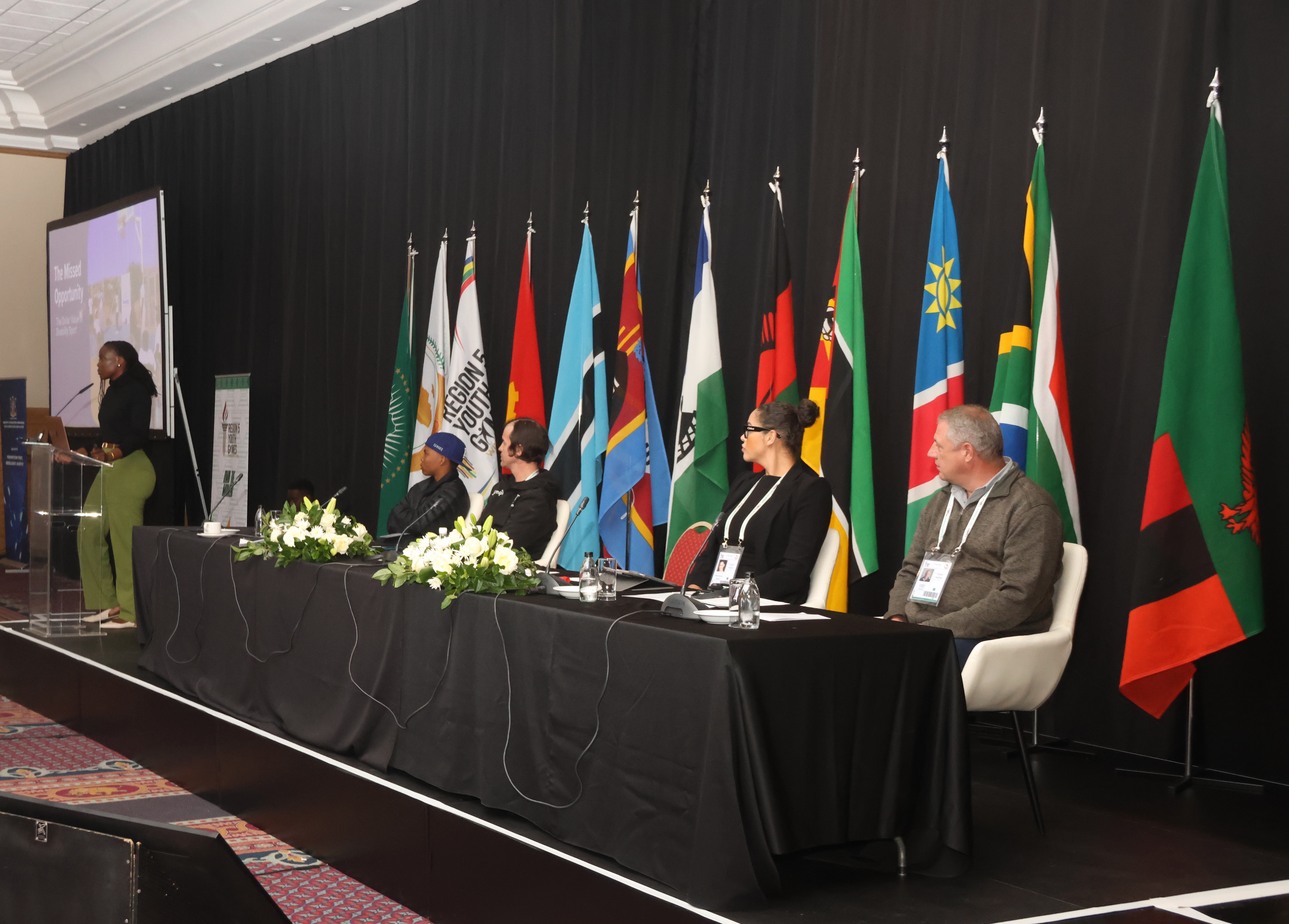 panel session at youth games ministerial forum with 5 panelists on stage Cover Image