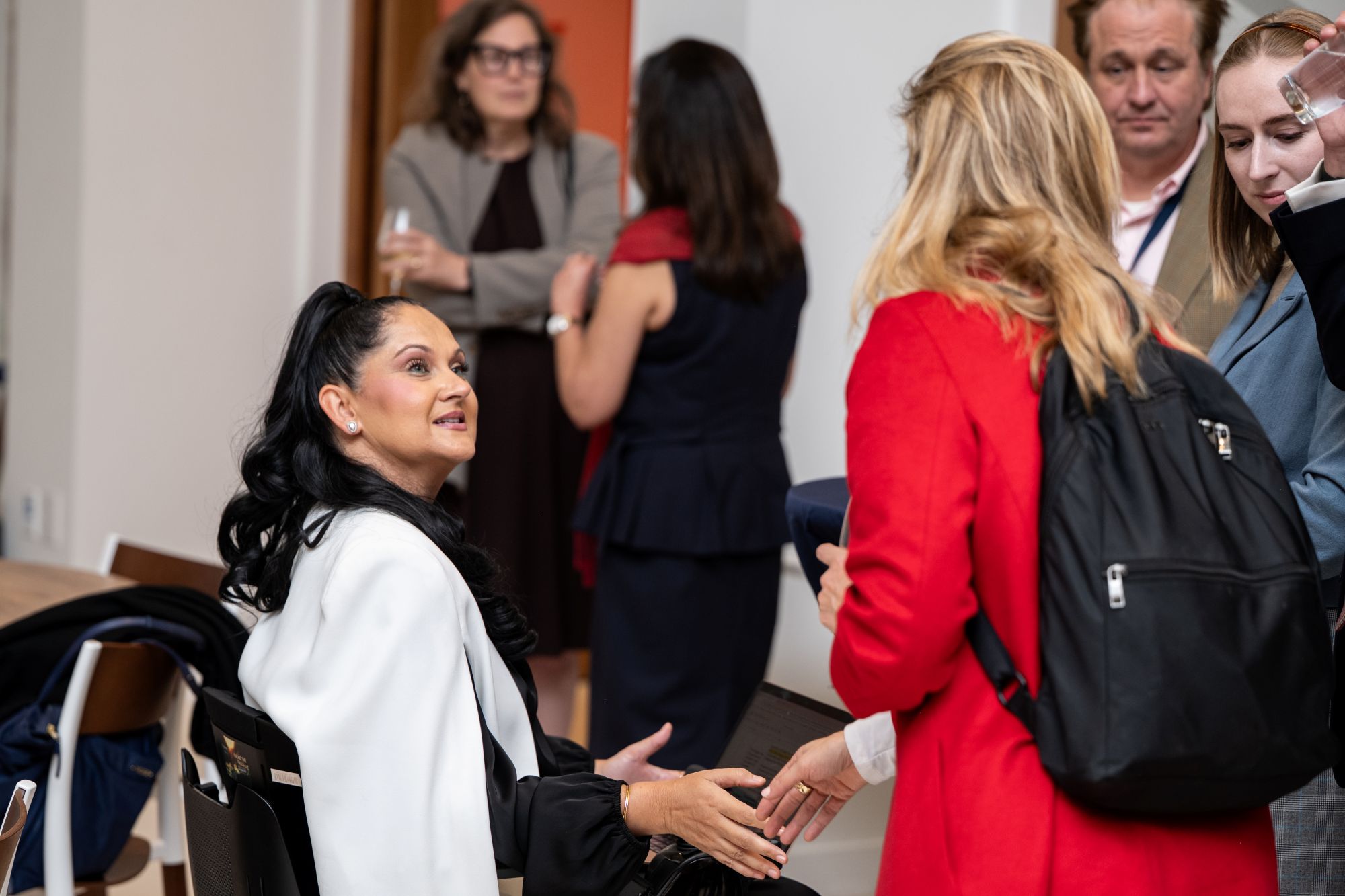 Drinks reception with discssions between guests