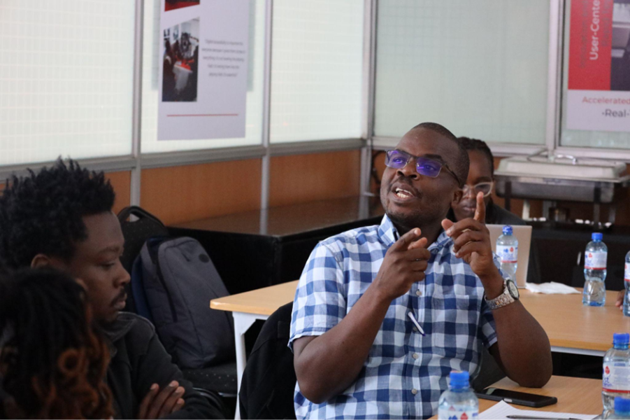 A person using their hands to gesticulate to someone a point.