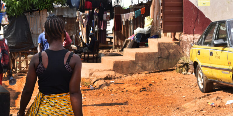 black woman in an informal settlement in Sierra Leone