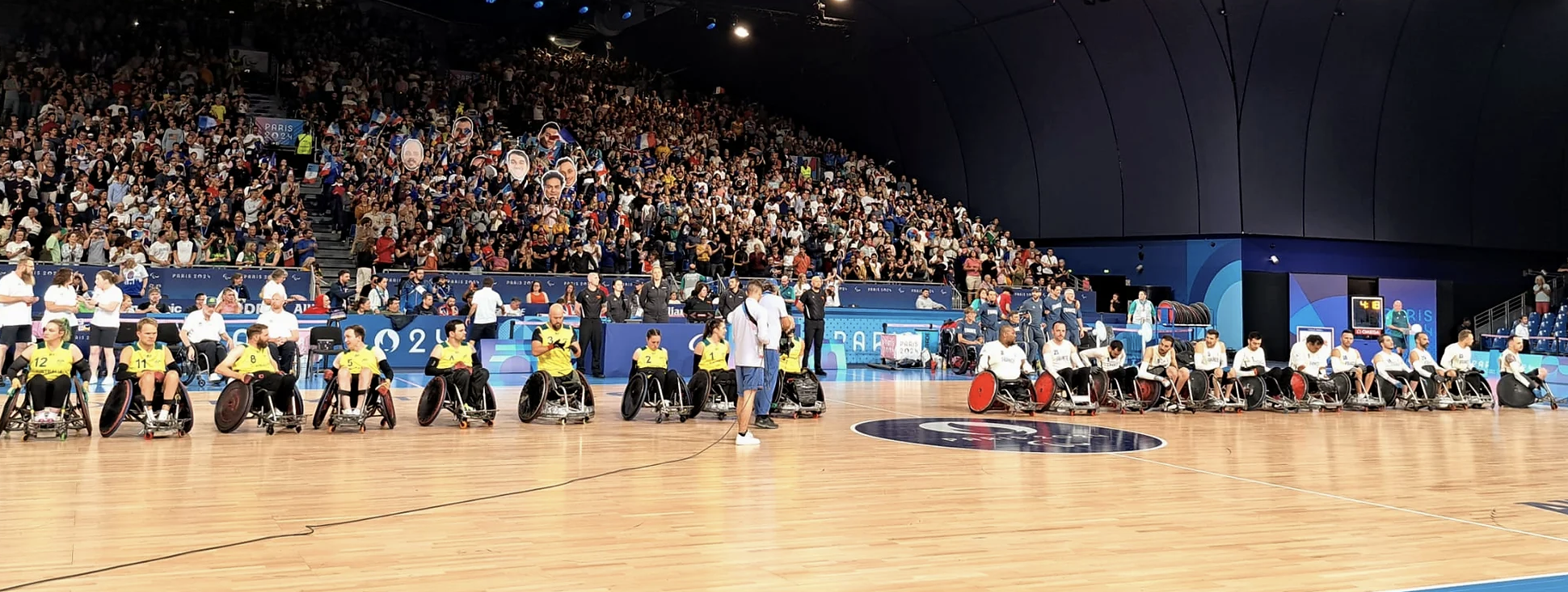 An image of wheelchair basketball paralympians before a game