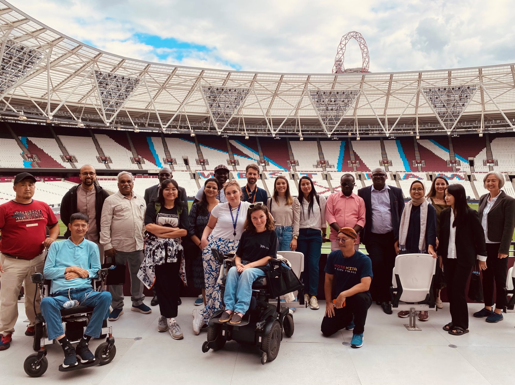 The AT2030 Inclusive Infrastructure team including local city partners at a comparison synthesis workshop in the Olympic Stadium on Queen Elizabeth Olympic Park, London,  September 2023. ​