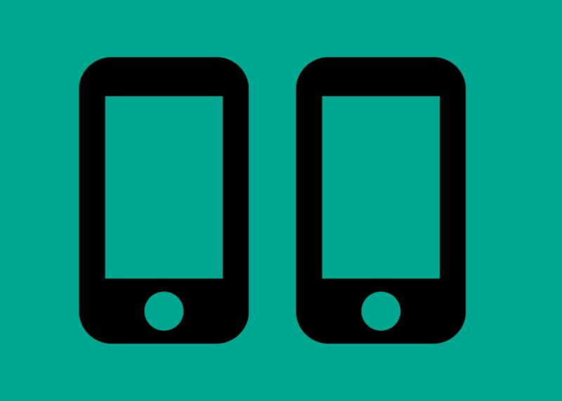 An Image of two phones on a green background