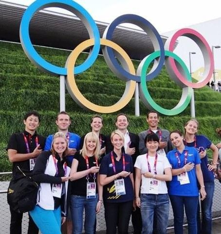 image with Ben and 10 colleagues at London 2012 under Olympic rings