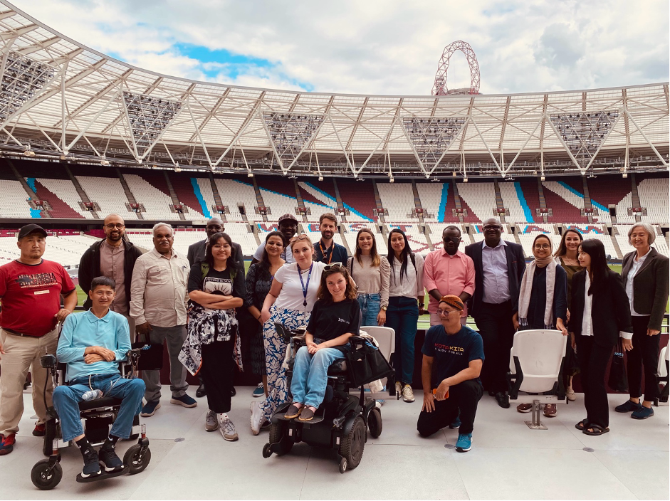 A group photo of the Inclusive Infrastrature team inside the Queen Elizabeth Olympic park