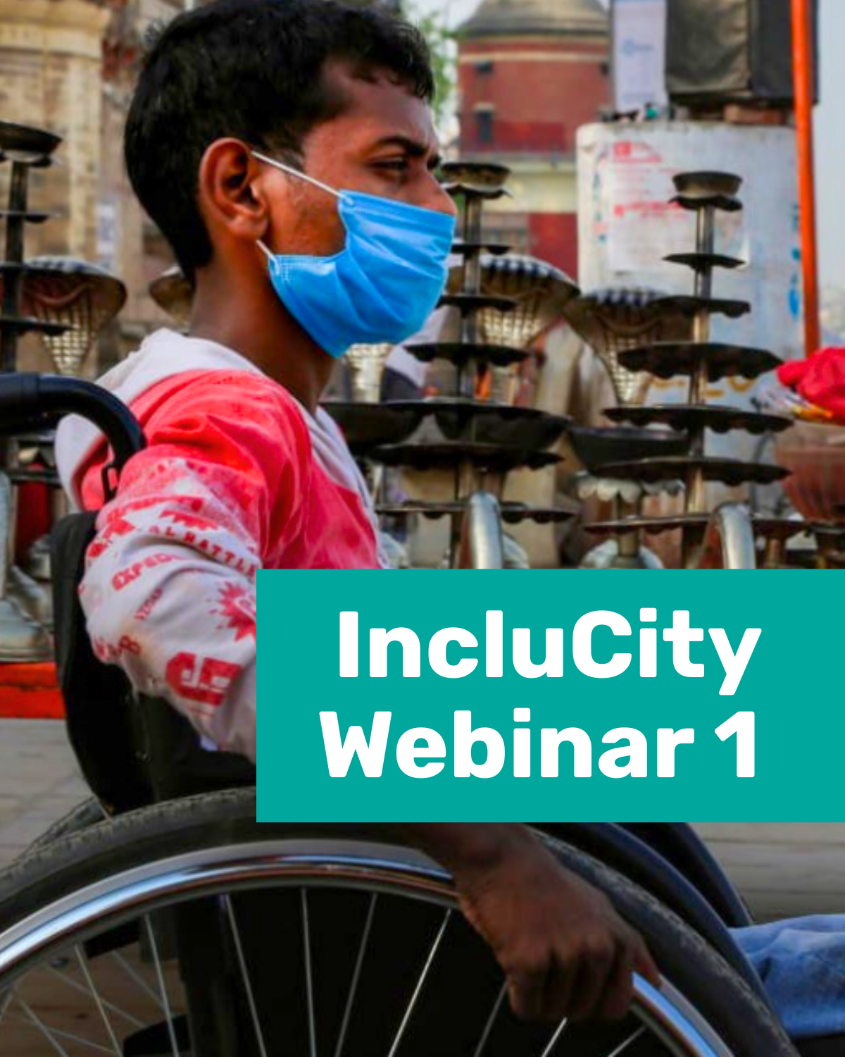 A close-up of a man in a wheelchair, wearing a white and red shirt and a light blue surgical face mask. The background is slightly out of focus, showing a busy outdoor area with various metal objects and people. A large teal-colored block on the right side of the image has the white text "IncluCity Webinar 1". Cover Image